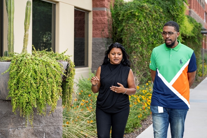 Aaron and Safiyyah during one of their regular “walk and talk” meetings. Aaron and Safiyyah during one of their regular “walk and talk” meetings.